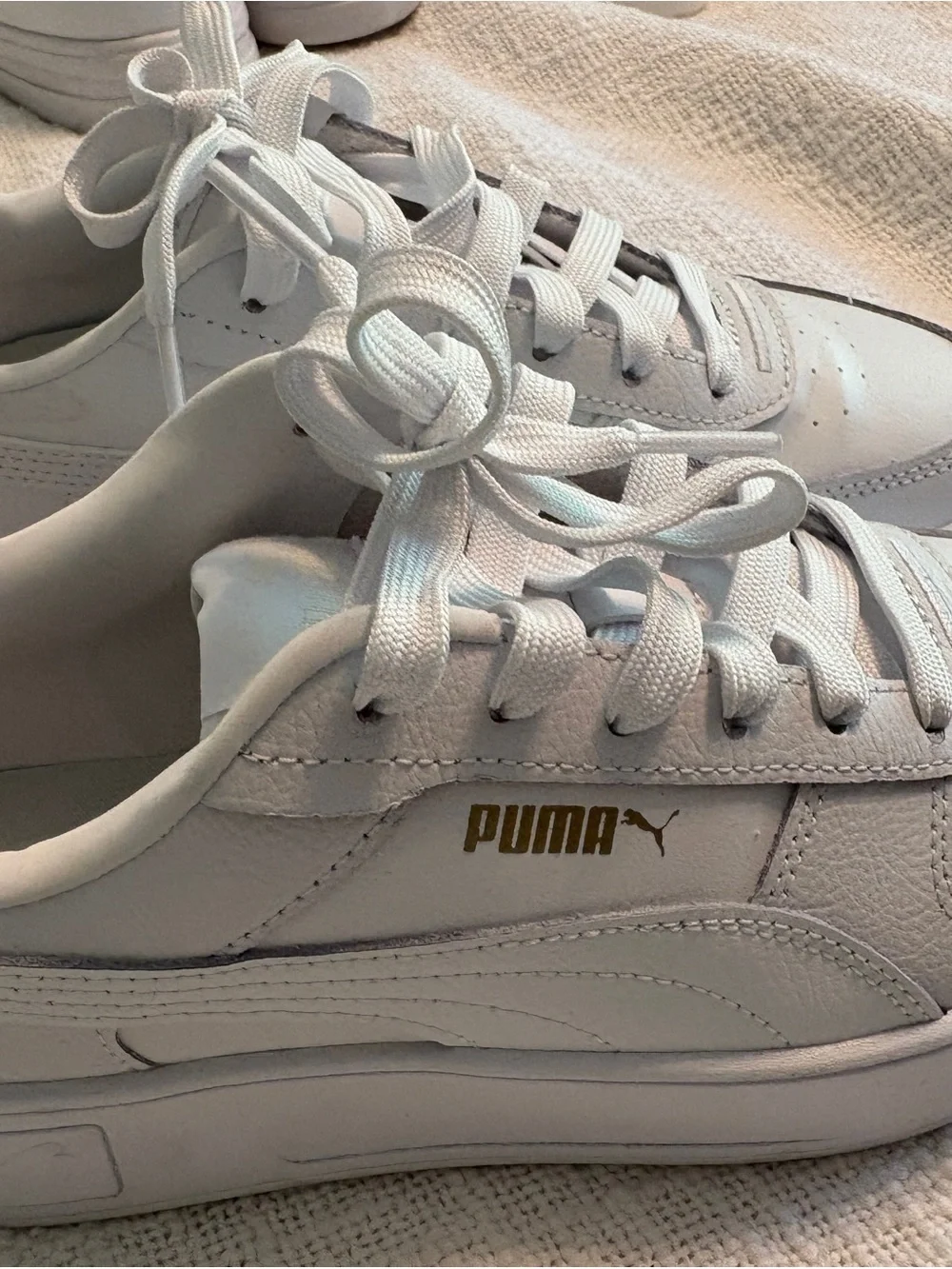 Puma White Leather Low-Top Sneakers with Gold Logo